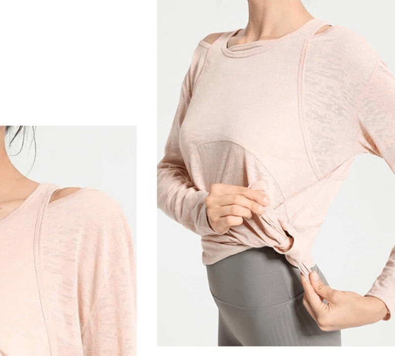 Stylish sporty lightweight women's top with long sleeves and cutouts, perfect for yoga or casual wear, in soft pink.